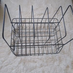 Black metal book organizer.